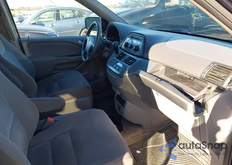 2010 Honda Odyssey Ex z USA, uszkodzony, nr VIN 5FNRL3H5XAB023174